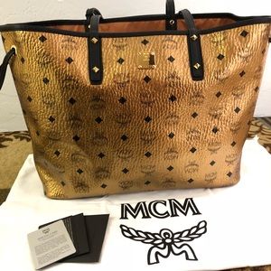 SOLD NO LONGER AVAILABLE MCM Executive Metallic Go